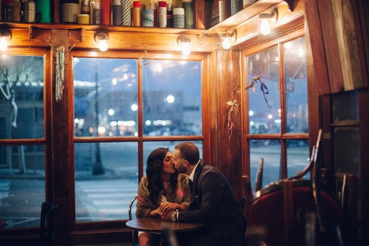 Engagement session in shop with books by Hattiesburg, MS Wedding Photographers - Starling & Sage